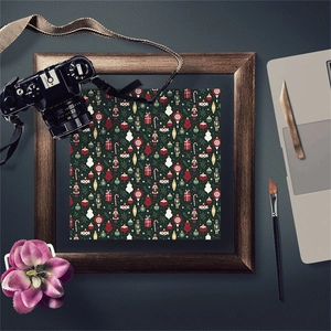 Framed Nutcracker vintage scrapbooking paper with festive Christmas patterns on dark green