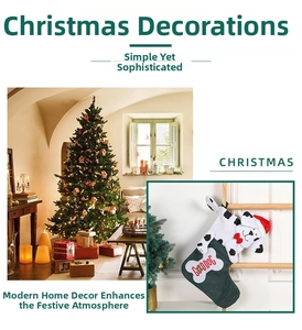 Detail of dalmatian dog Christmas stocking with bone embroidery and festive Santa hat