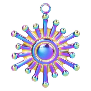 Macro detail of rainbow stainless steel sun pendant with loop for DIY jewelry necklaces