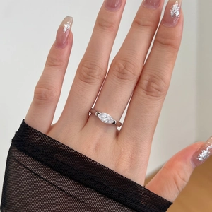Close-up of a marquise cut zircon ring in S925 silver worn by a hand model