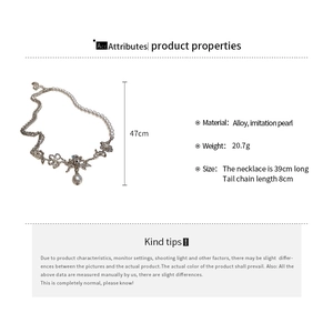 Detailed size specifications for the wrinkled metal rose and pearl necklace in white