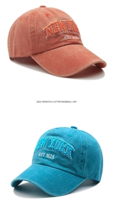 Detailed close-up of retro washed cotton baseball caps with 3D New York embroidery