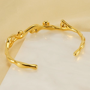 Bracciale vintage francese placcato oro 18k con perle eleganti e design organico unico