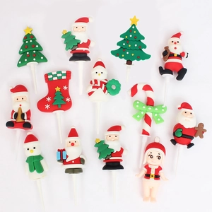 Detailed collection of 11 assorted Christmas cake toppers in colorful soft rubber material