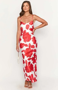 Detailed close-up of a floral satin maxi dress with vibrant red flowers and slim straps