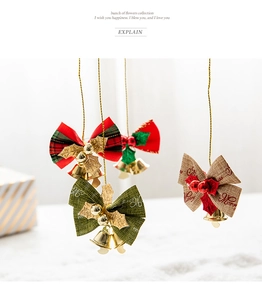 Close-up of 5cm Christmas bows with gold bells, red plaid and burlap festive ornaments