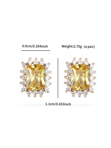 Detail view of gold earrings with square yellow gems and white crystals, size 1.1x0.9cm