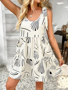 Beige sleeveless tiered mini dress with black abstract print and tie shoulder straps