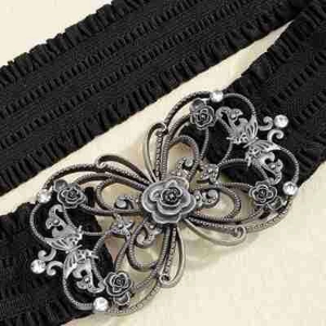 Black elastic waist belt with hollow silver butterfly buckle and rhinestone details