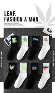 Close-up of street style cotton crew socks with colorful graffiti prints and slogans