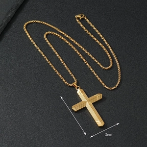 Detail showing gold striped cross pendant 5x3cm with 60cm stainless steel chain