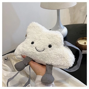 Detail of plush cloud crossbody bag featuring corduroy legs and smiling face