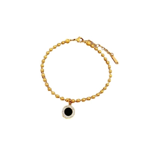 Golden bead chain bracelet with black agate round pendant and sparkling crystal halo