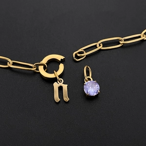 Gold titanium steel chain necklace with purple CZ and Gothic letter n pendant