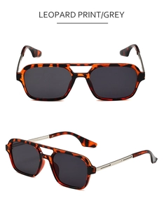 Detail of square pilot sunglasses featuring leopard print frames and slim metal temples