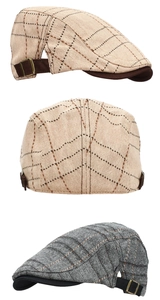 Detail of adjustable metal side buckle and textured khaki plaid on flat cap