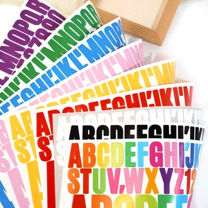 Detailed close-up of 3D waterproof vinyl alphabet stickers in various vibrant colors