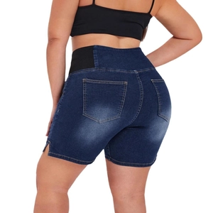 Women's plus size high waist denim shorts in dark blue with distressed wash and side slits