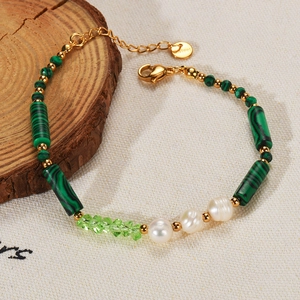 Malachite and pearl beaded stainless steel gold plated bracelet with lobster clasp