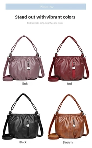 Detail showing pleated faux leather handbags in pink, red, black, and caramel brown colors