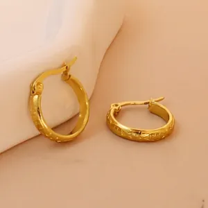 18K gold plated stainless steel hoop earrings featuring intricate dragon scale texture