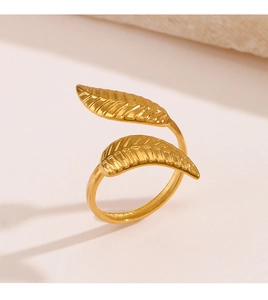 Detail of 18K gold plated leaf ring showing fine vein textures and polished finish