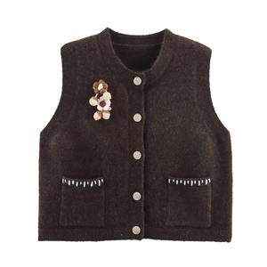 Gilet in maglia marrone scuro per bambini con bottoni bianchi e fiore in 3D