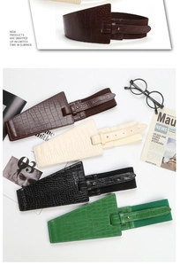 Detail of faux leather corset belt with crocodile texture and high elastic band