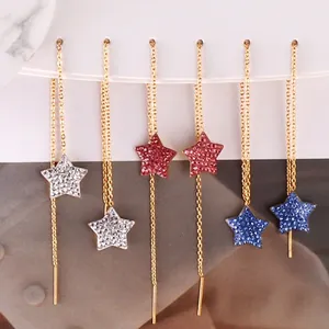 Long tassel star drop earrings in gold stainless steel with sparkling rhinestones