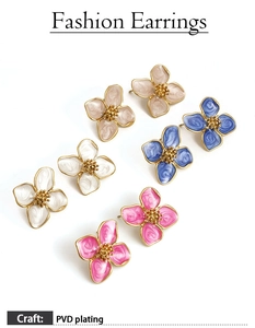 Detail view of 316L stainless steel flower earrings with enamel petals and PVD plating