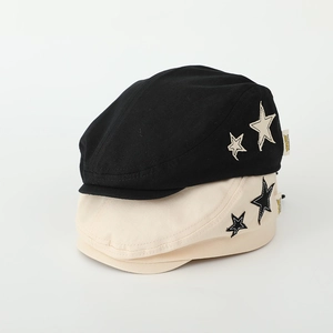 Classic flat caps for kids in black and beige with stylish star patches and side tags