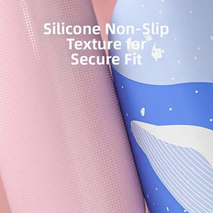 Detail of pink anti-slip silicone texture and navy blue whale print kids swim cap