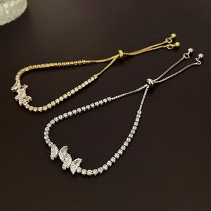 Adjustable zircon butterfly bracelet in gold and silver finish with sliding closure