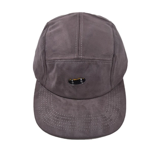 Detail view of five-panel charcoal camper hat with embroidered skateboard logo