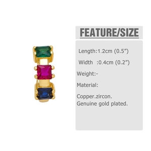 Detail view of gold ear cuff with emerald, pink, and blue square-cut cubic zirconia