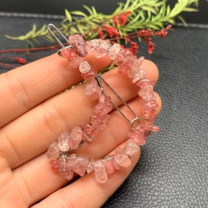 Detailed view of handmade silver barrette with pink natural crystal stones and wire wrapping