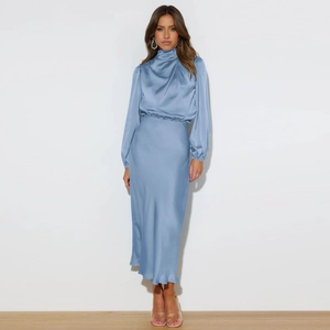Elegant mist blue satin halter neck dress with silky texture and long sleeves