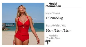 Detail of red halter neck swimsuit with front twist cutout and ruched tummy control