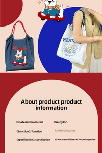 Detail view of cartoon dog embroidery and Freedom text on a nylon tote bag