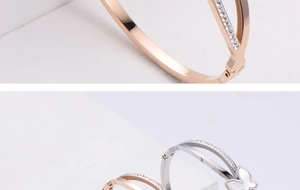 Detailed view of two-layer hollow rose gold bracelet with butterfly shell inlay and zircons