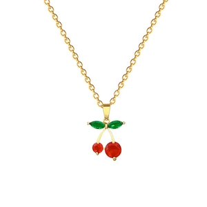 Luxurious gold necklace with red cherry crystal pendant on a clean white background