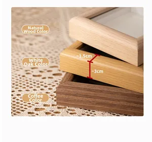 Macro detail of natural wood texture and corner joints on stacked 3cm deep square frames