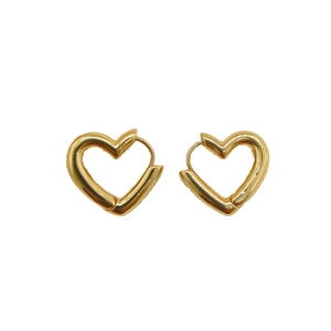 Detailed macro view of 18k gold plated chunky heart hoop earrings on a white background