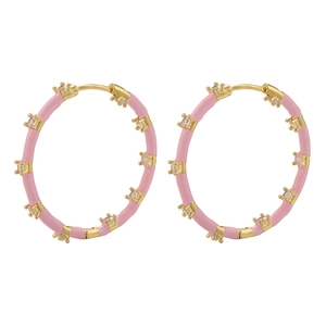 Close-up of pink enamel gold-plated hoop earrings with micro-pave cubic zirconia stones