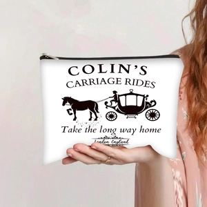 Detail of the black zipper closure on the vintage canvas carriage print makeup pouch