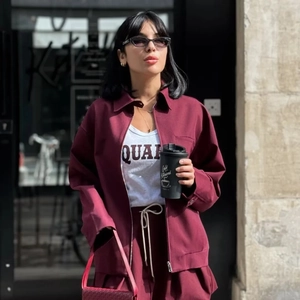 Chic burgundy two-piece set featuring lapel zip-up jacket and matching street style bottoms