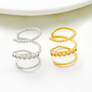 Minimalist multi-layer spiral ear cuff with sparkling zircon accents in gold and silver