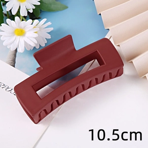 Frosted rectangular hair claw clip for women, stylish matte red hair catch accessory for daily wear.