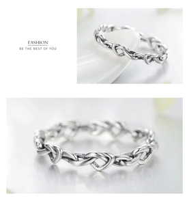 Detailed macro view showing the knot-shaped heart design on S925 silver ring