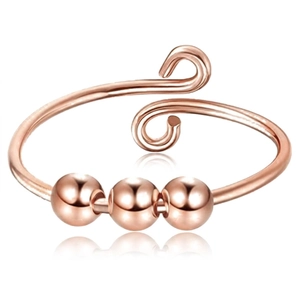 Rose gold anxiety ring with three rotating beads and a spiral open adjustable band